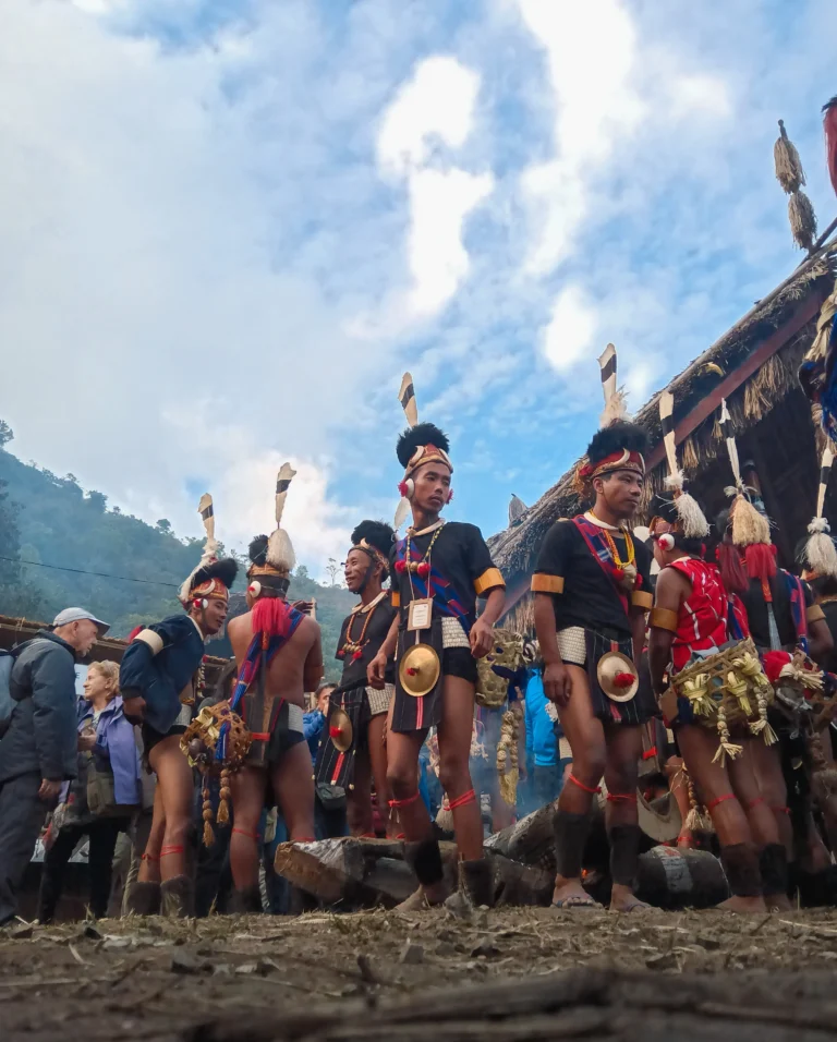 Naga men in traditional attire performing at the Hornbill Festival